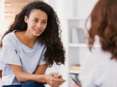 A certified alcohol and drug counselor working with a young adult.