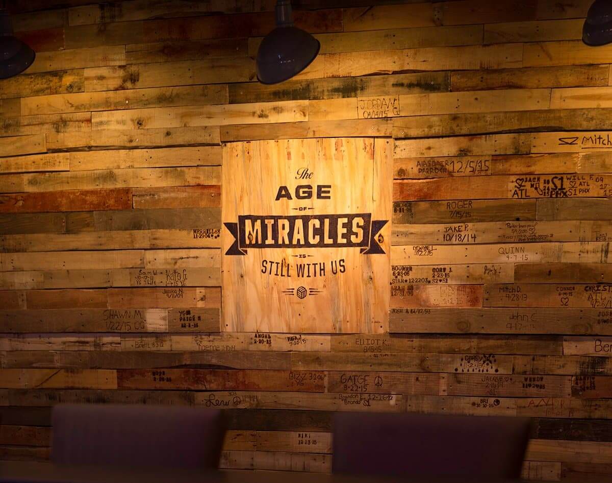 The wall in our coffee shop, with the tagline