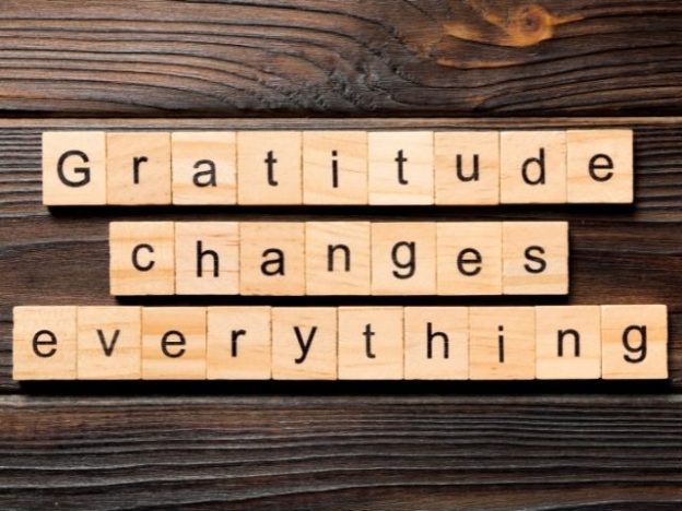 Tiles that say "gratitude changes everything".
